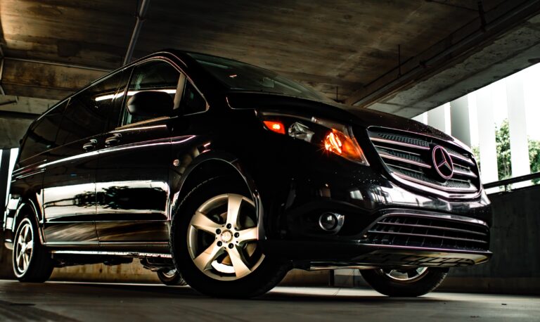 Black Mercedes-Benz Metris photographed from a low front angle, imported with American Car Imports.